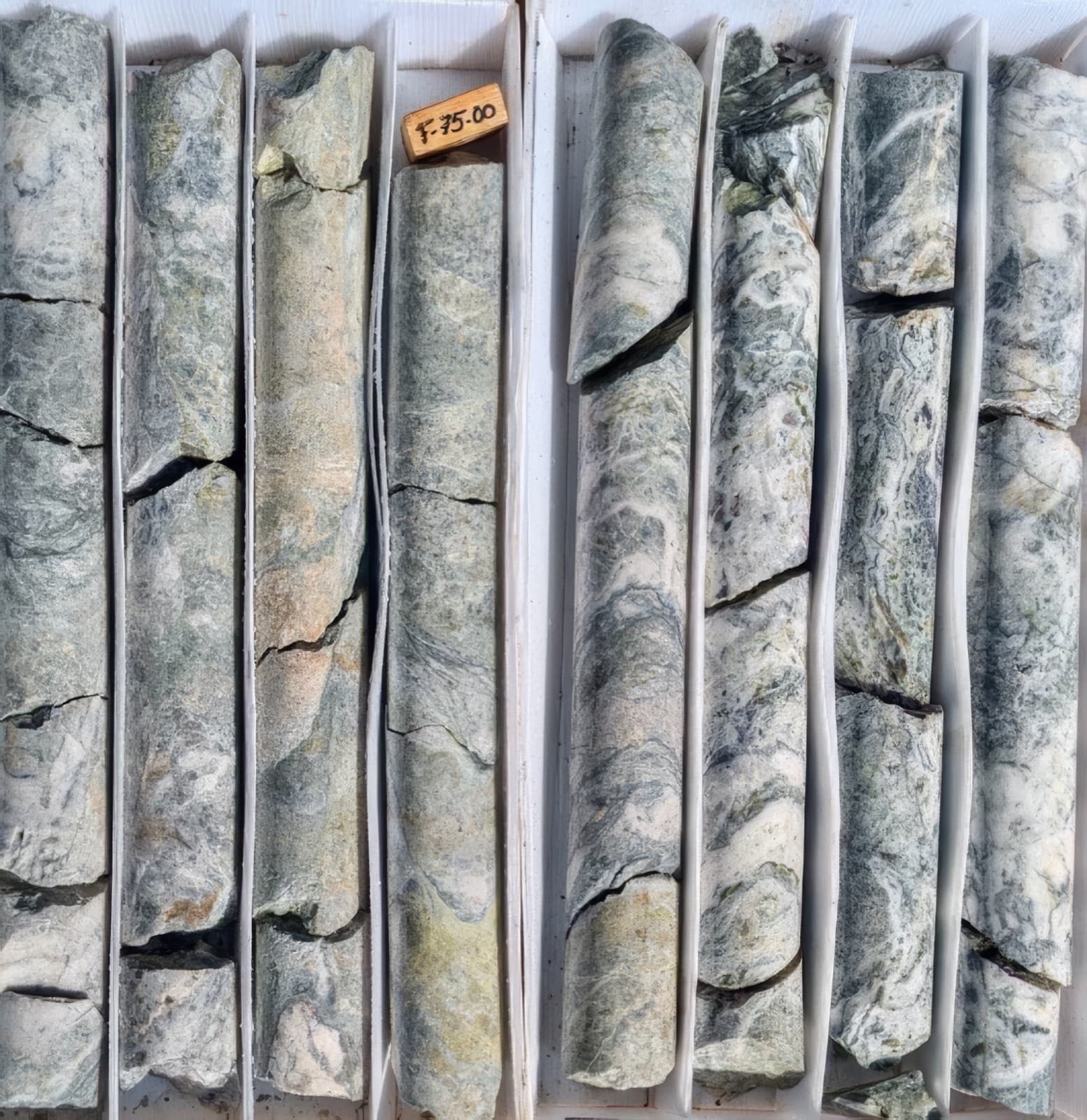 Boxed diamond drill core from the Copalquin District
